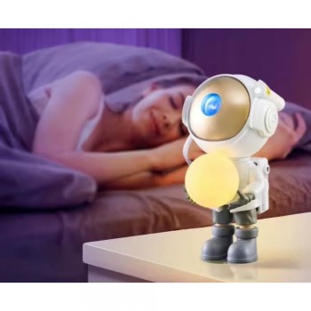 Нічний світильник-прожектор TDK-33 Астронавт Star Light, з музичною супроводом, змінними кольорами, автоотключення Нічний світильник-прожектор TDK-33 Астронавт Star Light, з музичною супроводом, змінними кольорами, автоотключення